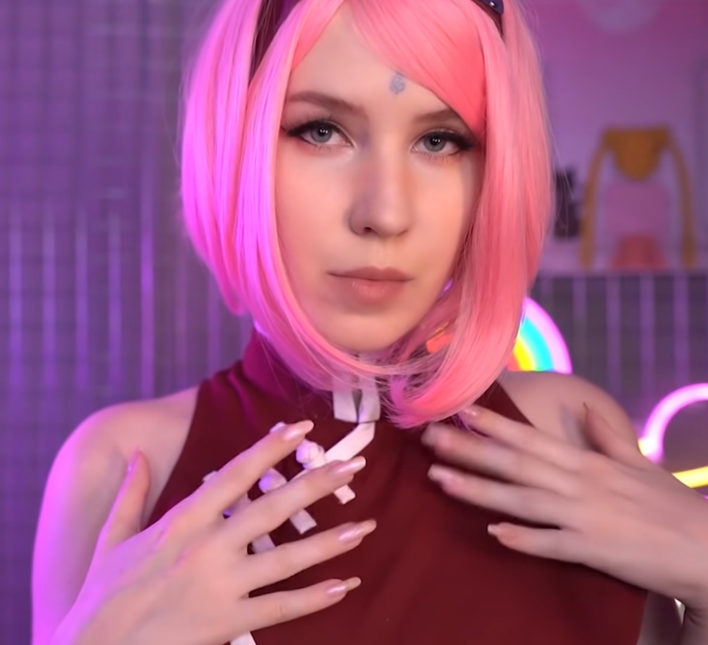 "asmr mood" wearing a pink wig looking sexy.