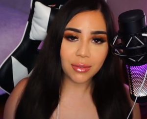 "Cyniiees Asmr" sitting in a gaming chair