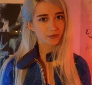 "Harley Quinn ASMR" in a blue outfit