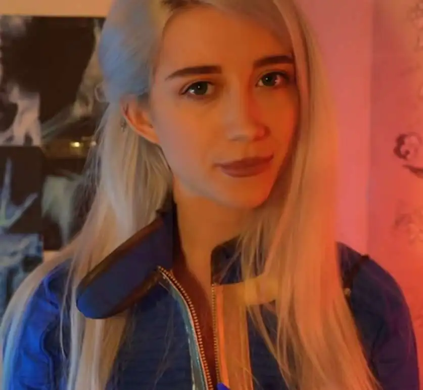 "Harley Quinn ASMR" in a blue outfit