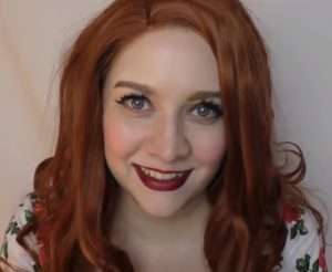 "OopsyDaisy Asmr" in a red wig