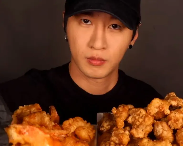 "Zach Choi Asmr" with orange food