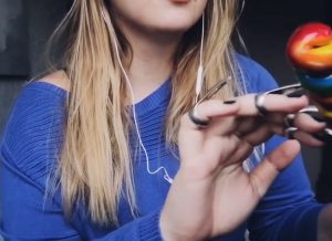 "a strange world asmr" in a blue outfit