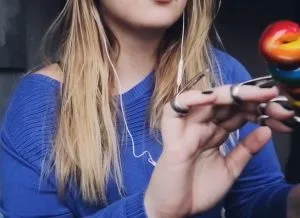 "a strange world asmr" in a blue outfit