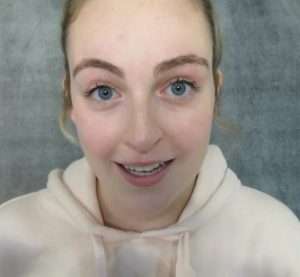 "Idyllic ASMR" wearing a white hoodie