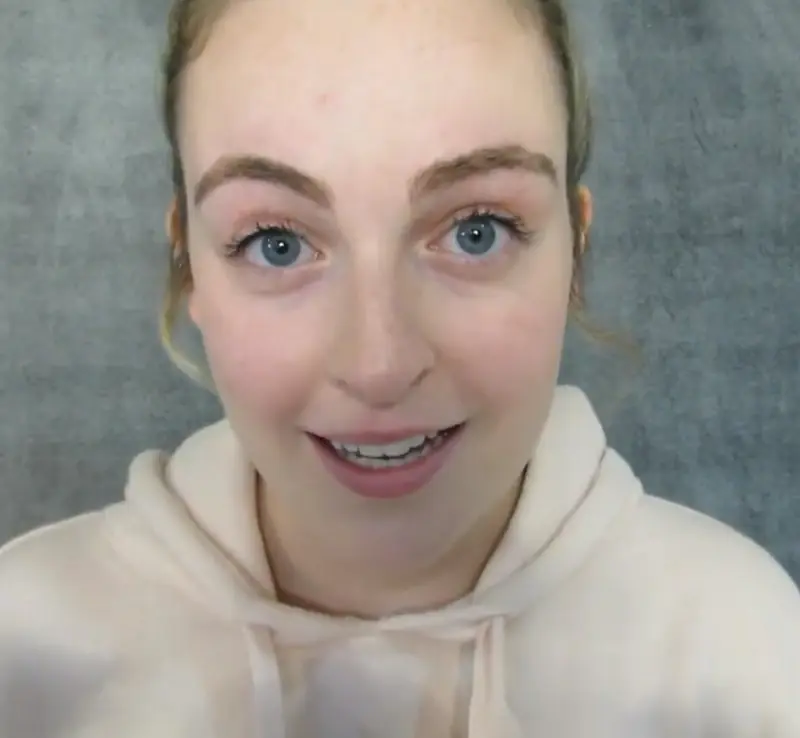 "Idyllic ASMR" wearing a white hoodie