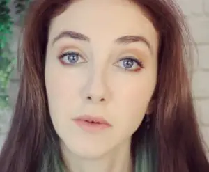 "VisualSounds1 Asmr" face selfie with auburn hair