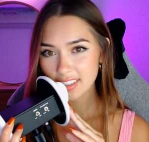 "Kailey Mae ASMR" wearing a pink top