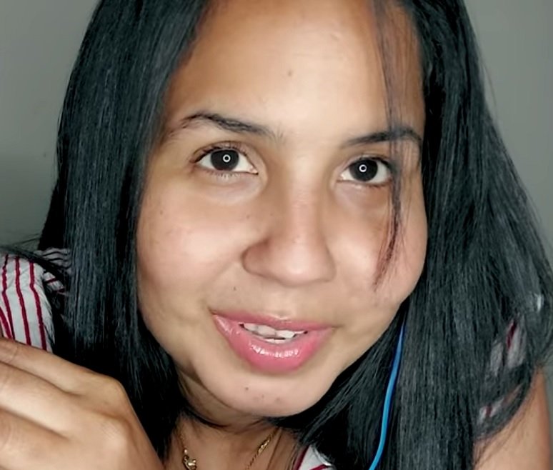 "Raquel ASMR en Espanol" with black hair and a wonderful smile.