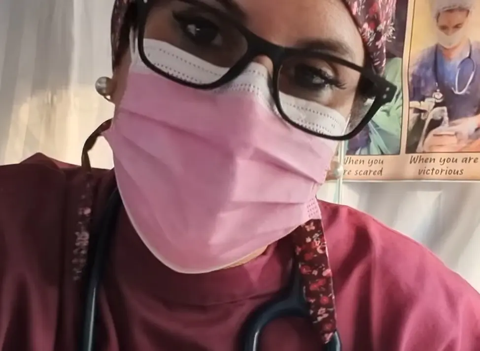 Alex Keeper in a pink mask