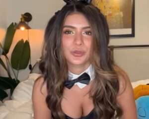 corneliusthecat performing asmr close up with long hair and soft smile