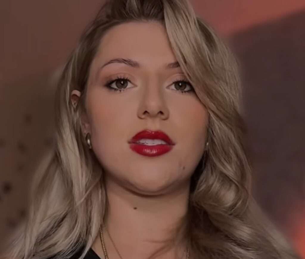 Whispered Worlds with red lip stick giving dommy mommy asmr