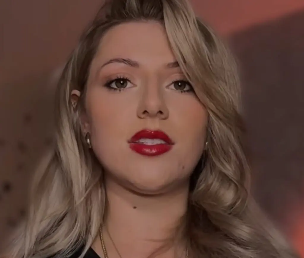 Whispered Worlds with red lip stick giving dommy mommy asmr