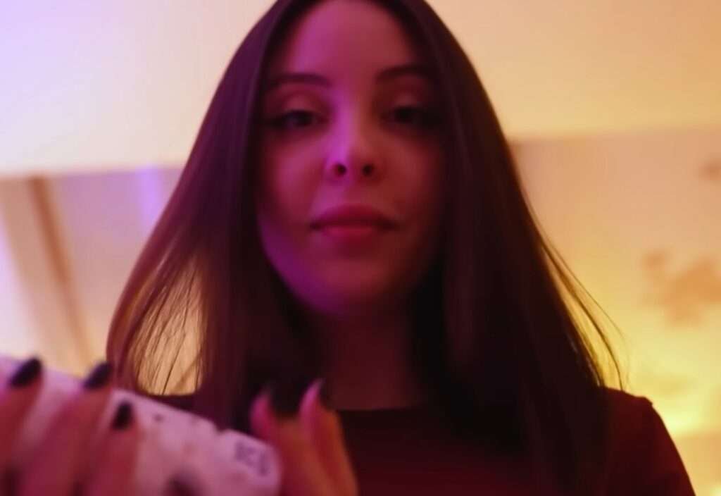 moona asmr creator with calm expression wearing casual headphones