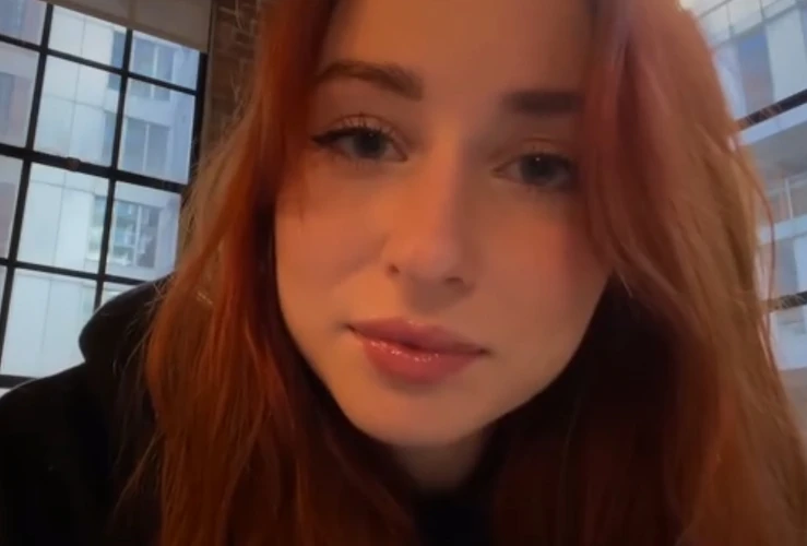 red haired asmr artist performing personal attention asmr