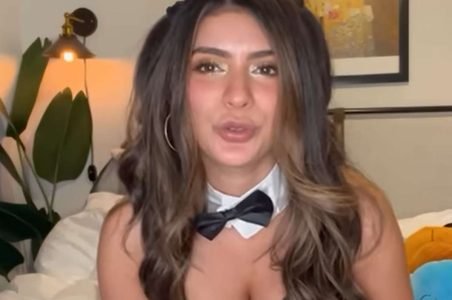 corneliusthecat performing asmr close up with long hair and soft smile
