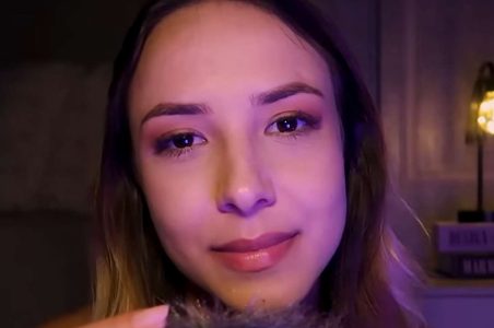 Larissa Volpati giving ASMR in a fluffy microphone