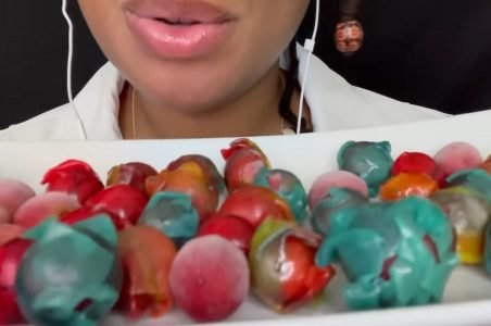 "Secret Serenity ASMR" eating frozen fruit rollups