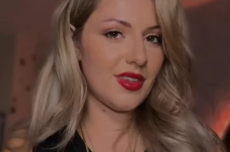 Whispered Worlds creating relaxing ASMR content, showcasing her signature calm and dominant style.