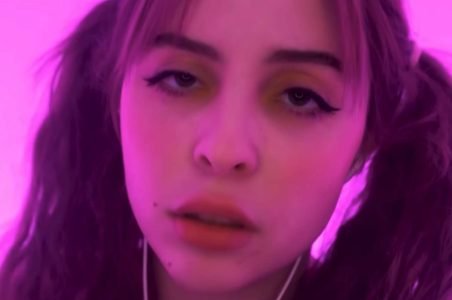 moona asmr artist with gentle smile and cozy room background